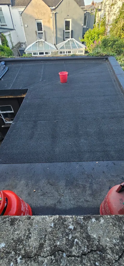 Flat roof installation completed by M Kelly Roofing Solutions